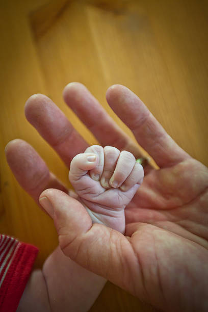Baby hand stock photo