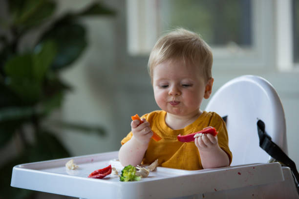 Baby healthy eating stock photo
