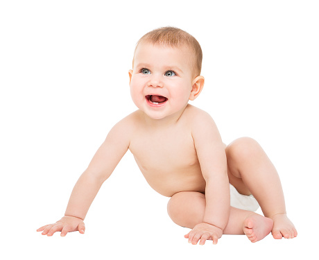 One Year Old Naked Baby Boy Crawls On A White Background 