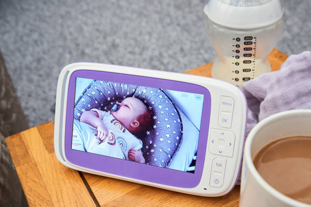 Baby monitor on coffee table stock photo