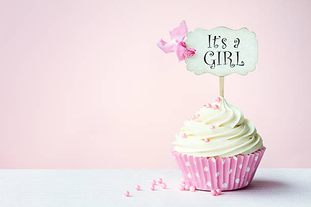 Baby shower cupcake Baby shower cupcake with copy space to side it's a girl stock pictures, royalty-free photos & images