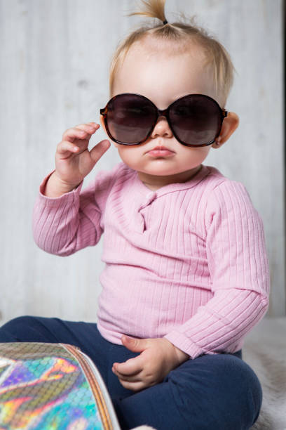 Baby with glasses stock photo