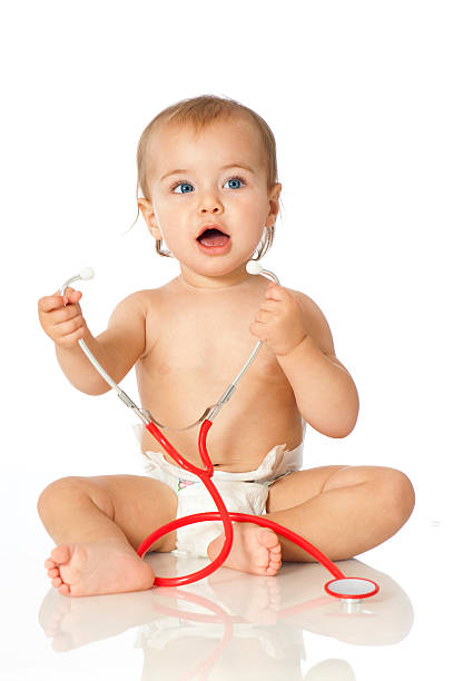 Baby with stethoscope stock photo