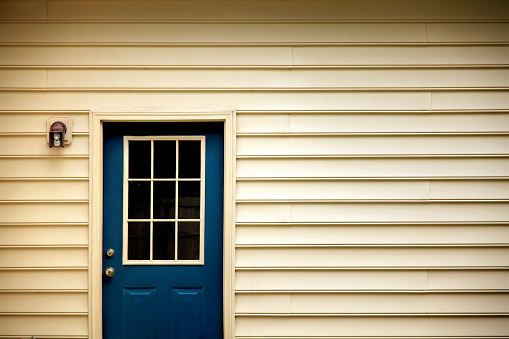 close up shot of back door of the house.