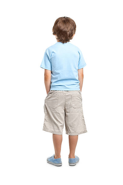 back of 8 years old boy stock photo