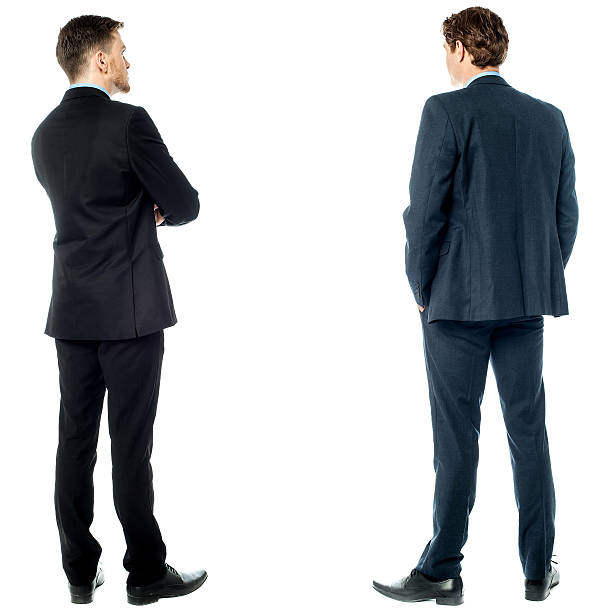 Back pose of handsome young corporates stock photo