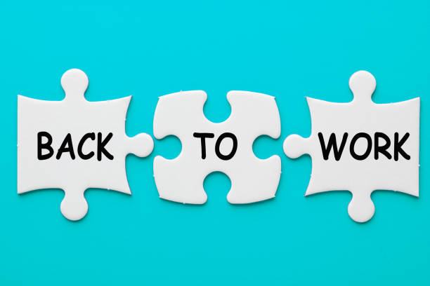 Back To Work Concept Back to work phrase in 3 pieces paper puzzle on red background. Business concept. returning stock pictures, royalty-free photos & images