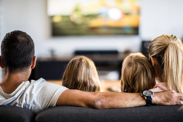Family watching tv and movies