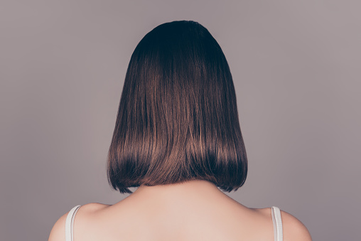Back View Of Young Beautiful Wonam With Short Symmetric Hair