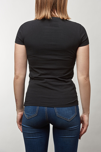 Back View Of Young Woman In Black Tshirt With Copy Space Isolated On ...