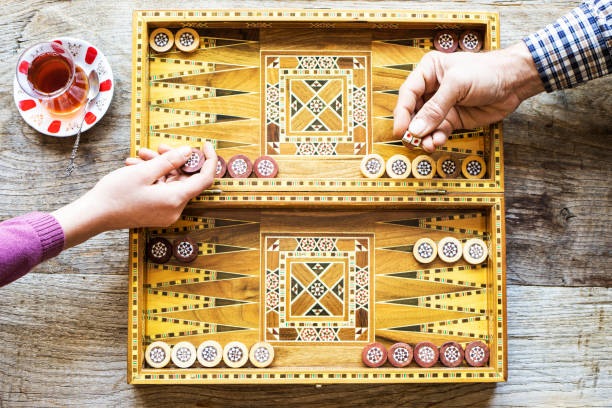 Backgammon game with two dice Backgammon game with two dice backgammon stock pictures, royalty-free photos & images