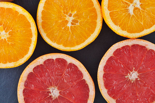 Background from the oranges and grapefruits stock photo