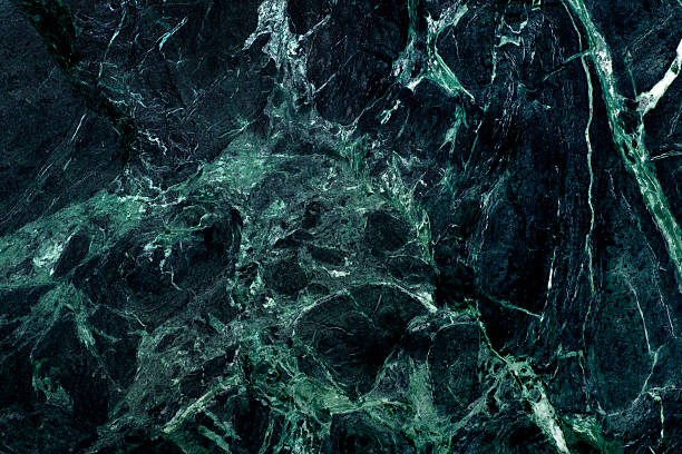 Background of Marble This is an overhead photo of a green marble background. marble rock stock pictures, royalty-free photos & images