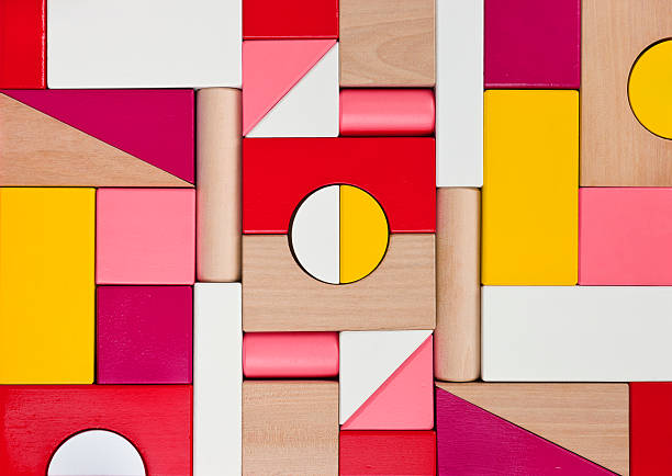 background of multicolor wooden children toy blocks - blok vorm stockfoto's en -beelden