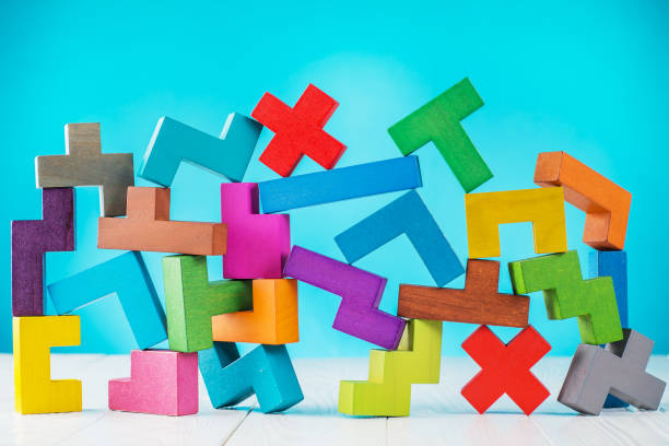 Background with multicolored shapes wooden blocks. stock photo