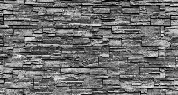 Backgrounds of black stone wall stock photo