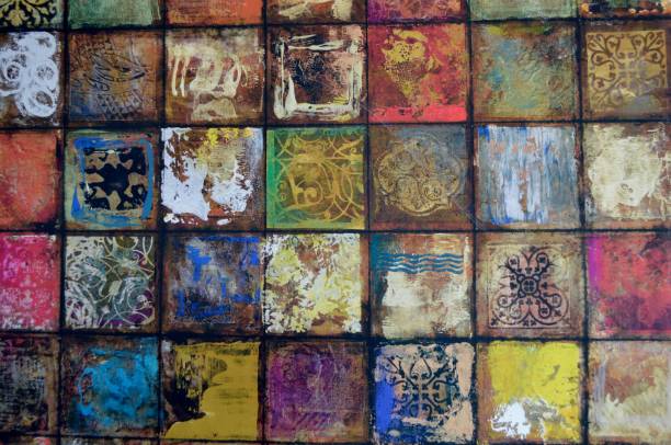 A Background/Wall of Rustic, Vintage Colored Squares with Muted Tones stock photo