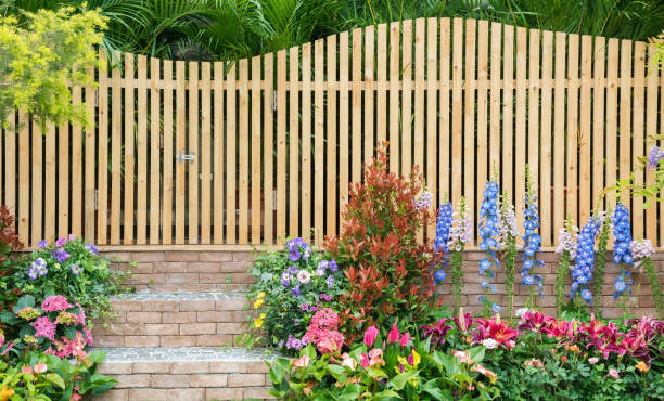 backyard flower garden entrance and wooden fence of backyard flower garden fence stock pictures, royalty-free photos & images