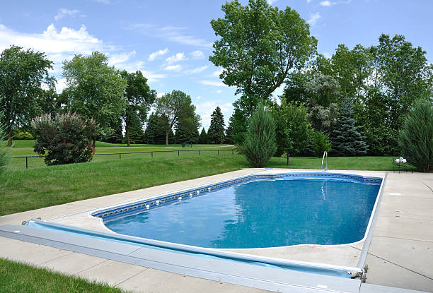 Backyard In-Ground Swimming Pool stock photo
