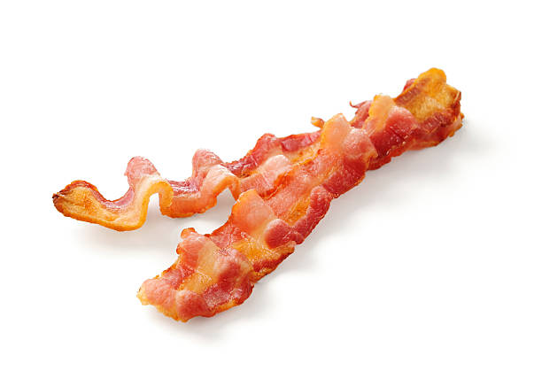 Bacon Bacon on white background.  Please see my portfolio for other food and drink images. bacon stock pictures, royalty-free photos & images