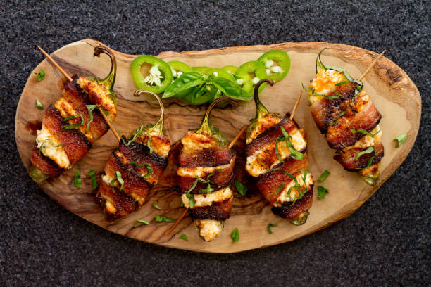 Bacon wrapped jalapeno poppers stock photo