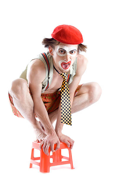 bad clown on the stool stock photo