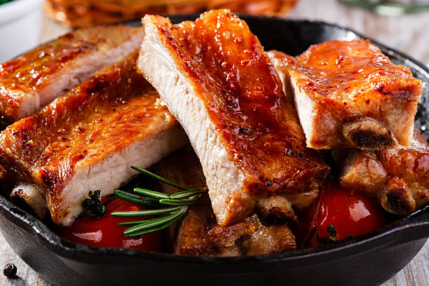 baked pork ribs stock photo