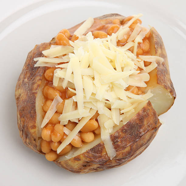Image Of Filled Baked Potato Baked Beans And Grated Cheese Stock Photos ...