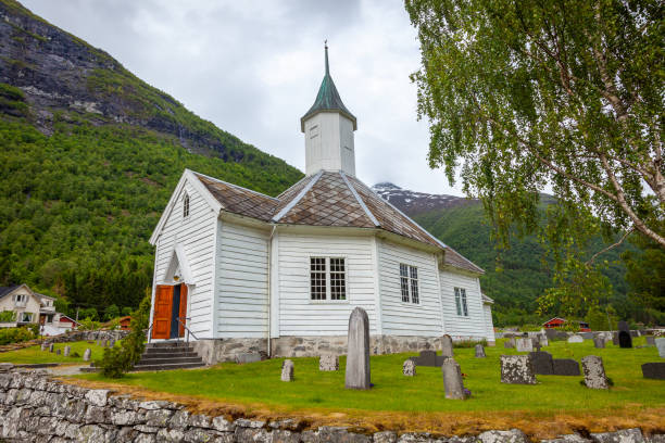 Bakka wooden catholic Church and tombstones in Aurland, Norway stock photo