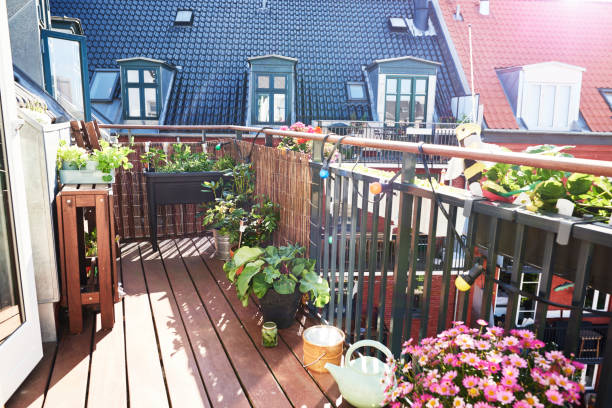 balcony garden The balcony has a 5th floor - there are no people on the balcony. the sun shines balcony stock pictures, royalty-free photos & images