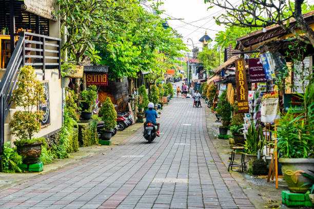 Bali, one of the central streets of Ubud, full of bars, restaurants and stores. stock photo