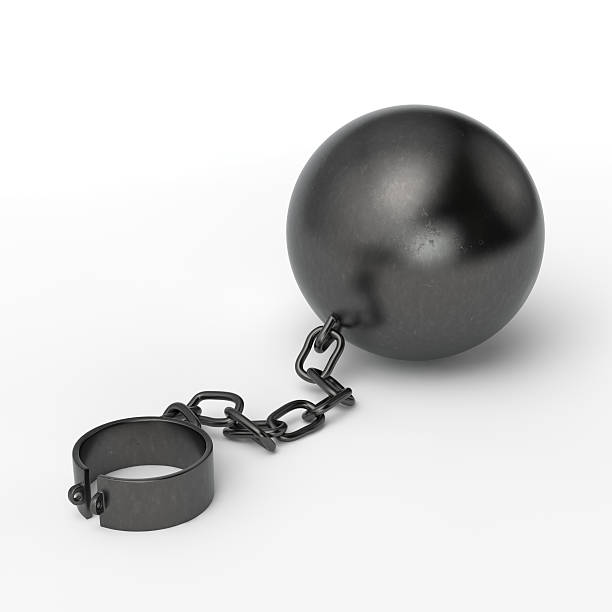ball and chain - ball and chain stock photos and pictures.
