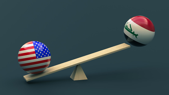ball in the colors of the national flag of the United States swings a ball in the colors of the Iraqi flag against a neutral background. 3D rendering. Design blank. Layout. Policy concept