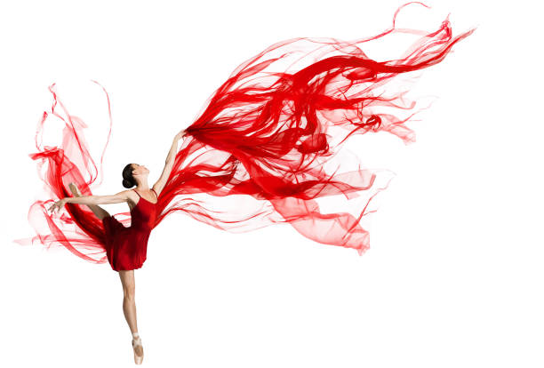 Ballerina Dance. Woman dancing Red Fabric. Graceful Ballet Dancer jumping in Air. Red Cloth flying waving on Wind. Isolated White Background stock photo