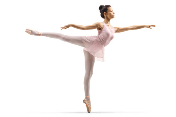 Ballerina in an arabesque pose Full length shot of a ballerina in an arabesque pose isolated on white background arabesque position stock pictures, royalty-free photos & images
