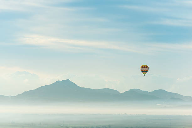 Balloon over fog at the morning stock photo