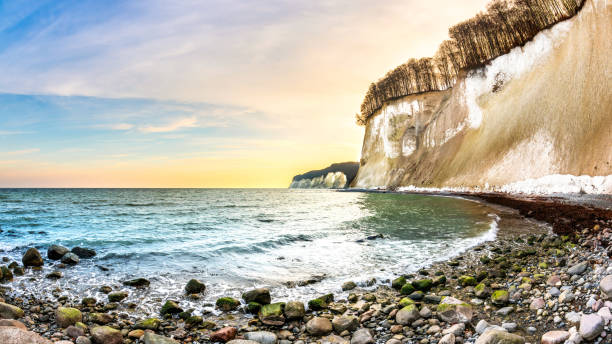 Baltic Sea with the chalk cliffs of Rügen Chalk cliffs on Rügen in autumn chalk rock stock pictures, royalty-free photos & images