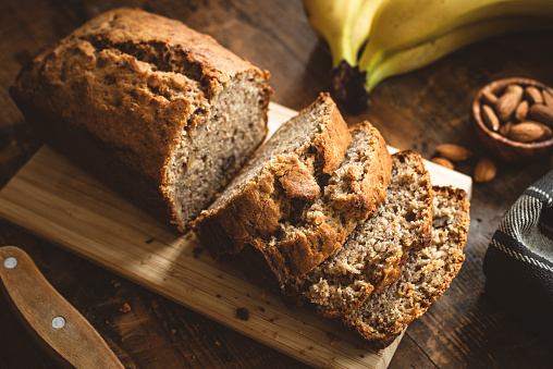 Banana Bread Loaf On Wooden Table