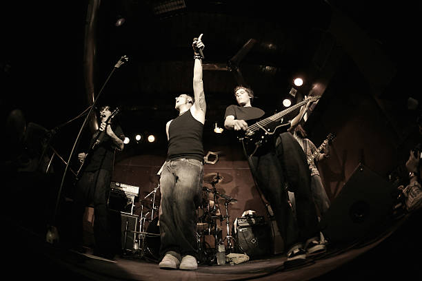 Band performing on stage, fisheye stock photo