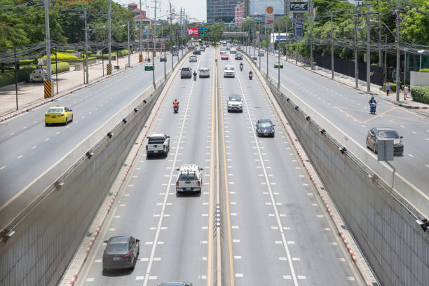 Bangkok Thailand , May 18 , 2021 : Traffic in the intersection tunnel on the roads of Bangkok, Thailand stock photo