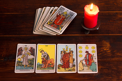 https://media.istockphoto.com/photos/bangkokthailandmarch1520on-the-table-are-fortunetelling-tarot-cards-picture-id1213278298?b=1&k=20&m=1213278298&s=170667a&w=0&h=xUTzeP2eiVPpy351lGfY261noMMjy0o4ms2dATZJvk4=
