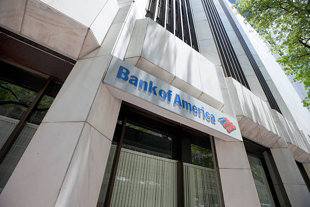 Bank of America branch in Downtown Miami "Miami, Florida, USA - May 7, 2012: Logo and sign of a Bank of America branch located in Downtown Miami." bank of america stock pictures, royalty-free photos & images