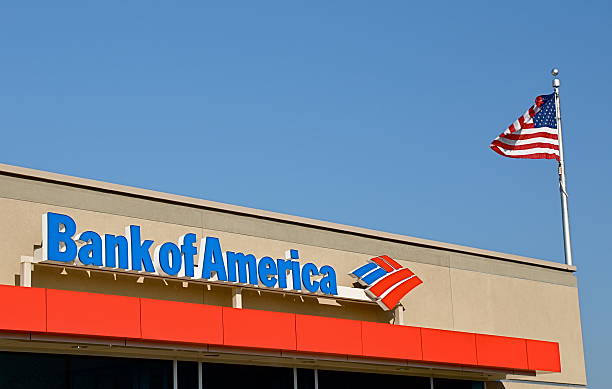 Bank of America sign "Falls Church, VA, USA - August 17, 2011: Bank of America sign.  Bank of America Corporation (NYSE:A BAC) is an American multinational banking and financial services corporation  It is the largest bank holding company in the United States, by assets.  In 2010, Bank of America was the 5th largest company in the United States by total revenue." bank of america stock pictures, royalty-free photos & images