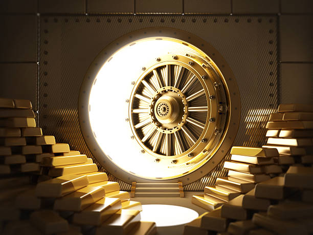 Bank vault Bank vault full of gold ingots with half open door.Similar: Gold  stock pictures, royalty-free photos & images
