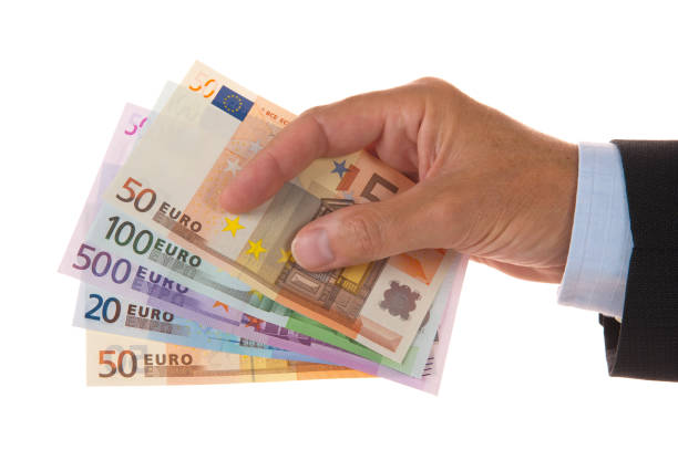 banknotes of European currency holding in hand stock photo