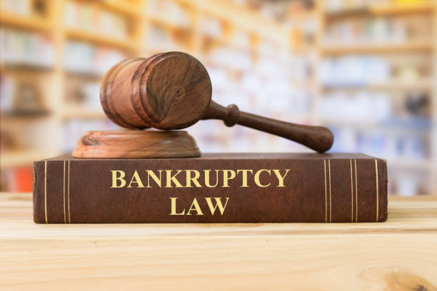 bankruptcy law Bankruptcy Law books with a judges gavel on desk in the library. Concept of bankruptcy law,legal education. bankruptcy stock pictures, royalty-free photos & images