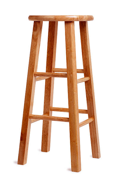 Bar Stool on white This is a photo of a tall wooden stool on a white background. There is a clipping path included with this file. stool stock pictures, royalty-free photos & images