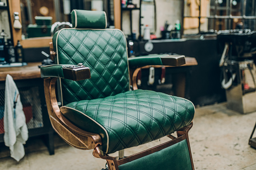 Old vintage chair in barber shop.