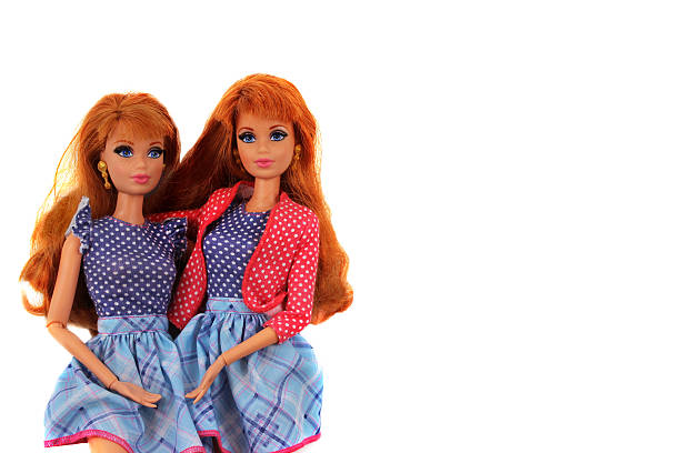 barbie doll twins with copy space - barbie stockfoto's en -beelden
