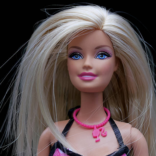 barbie on black - barbie stockfoto's en -beelden